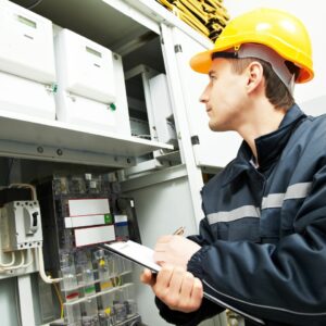 Qualified Electrician performing a safety check
