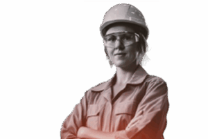 Woman in hard hat and safety glasses, arms crossed