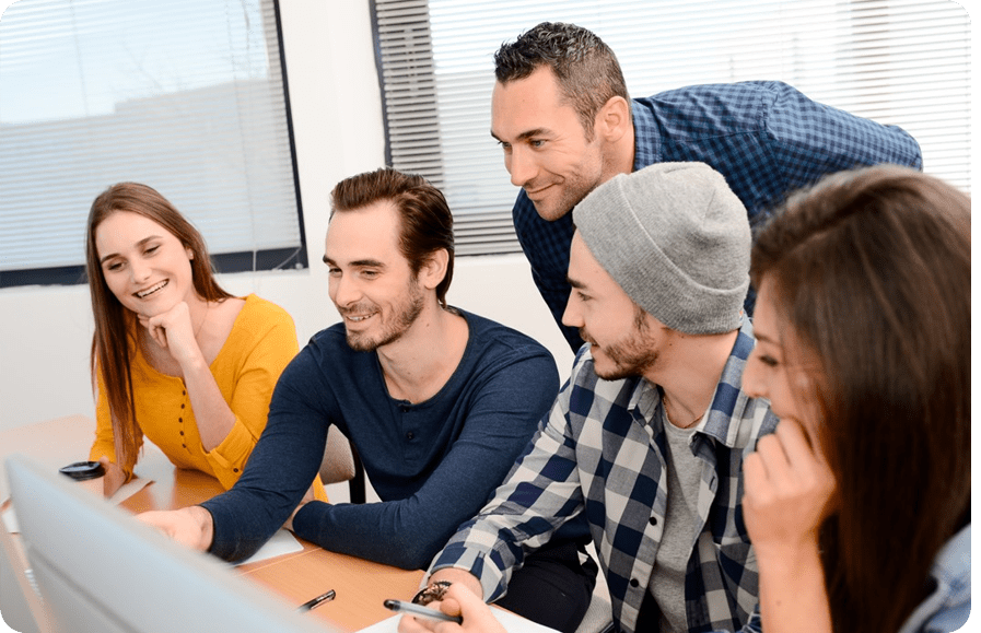 Group of students looking at a computer screen.